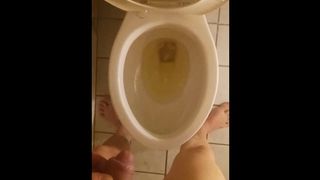 Peeing in a Toilet Naked and Barefoot