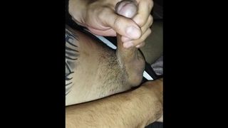 athletic dude pulls his dick until he cumming on himself
