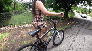 On the street on a bicycle with an anal plug, a driver saw my bum outdoors