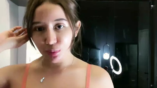 Camgirl plays with her breasts and exposing cameltoe perfect indonesian cunt