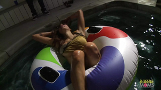 Brunette chick fucking with a friend after taking a late night swim in the pool