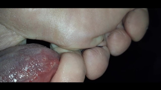 Eating sock lint from between her unkempt cougar toes