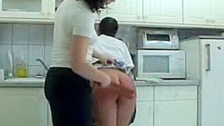Spanked in the kitchen